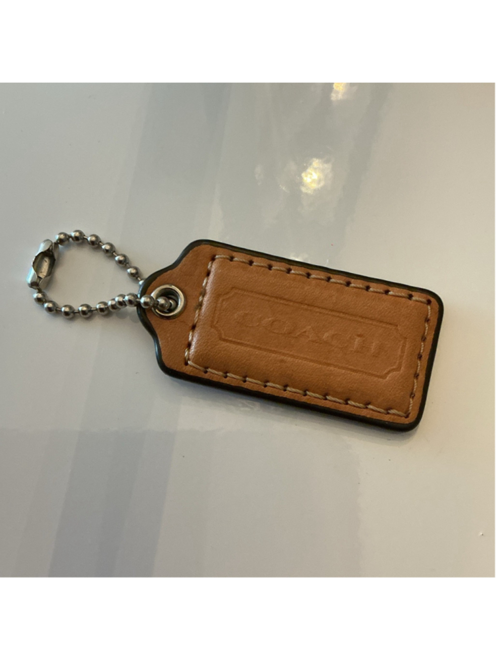 Coach Tan Bag Tag